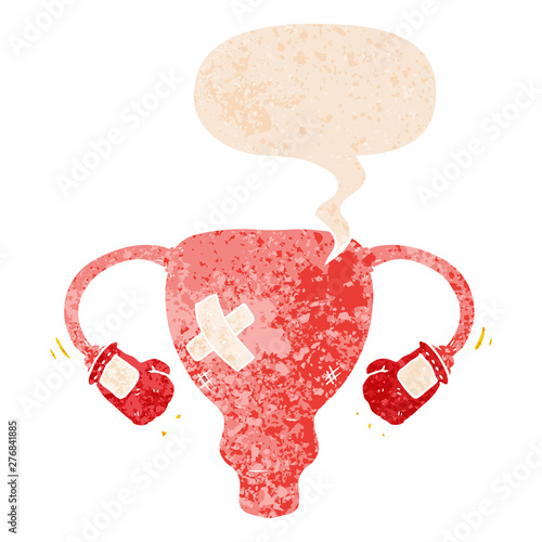 cartoon beat up uterus with boxing gloves and speech bubble in retro textured style