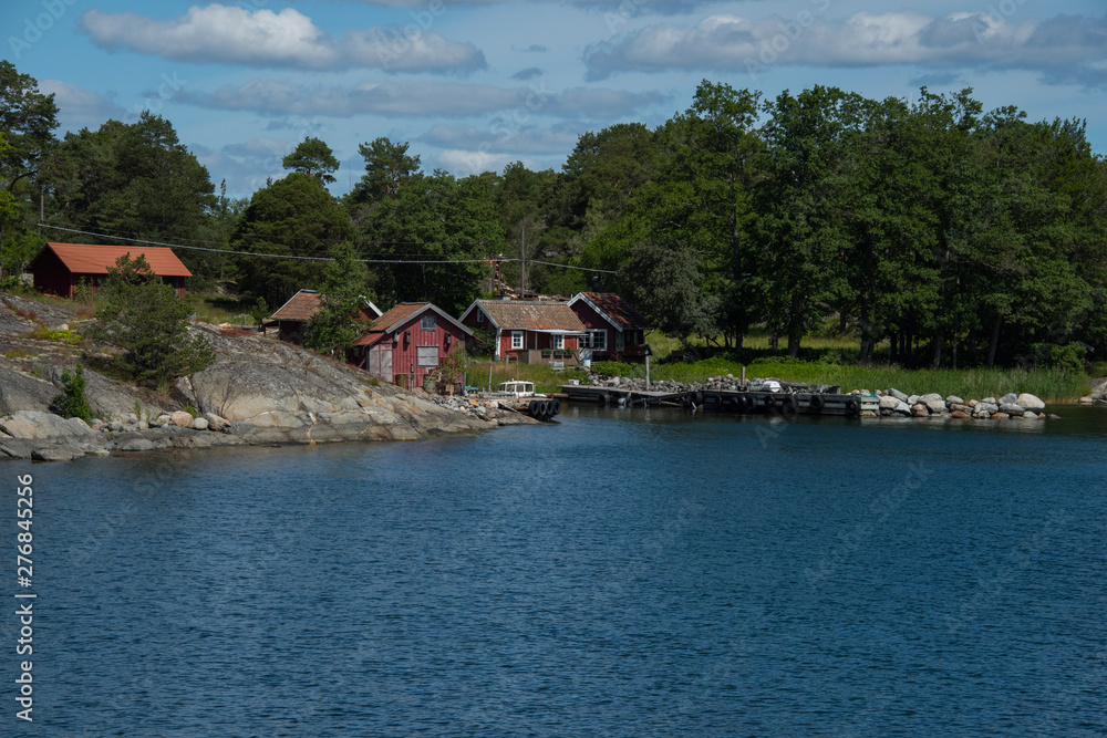 Islands in the Stockholm outer archipelago a sunny sommer day around the bay Bergbofjärden at the island Möja Islands in the Stockholm outer archipelago a sunny sommer day around the bay Bergbofjärden at the island Möja