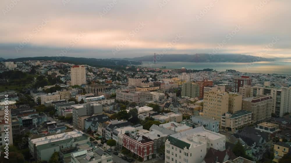 Establishing Aerial View Down Town San Francisco Low clouds sun set bay bridge Establishing Aerial View Down Town San Francisco Low clouds sun set bay bridge