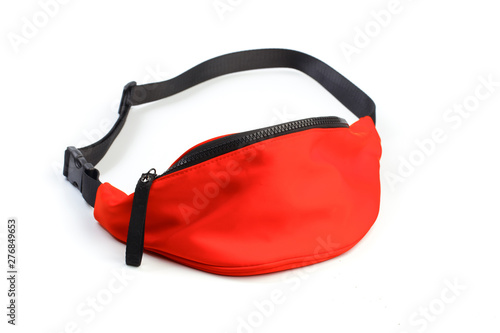 red waist pouch isolated on white background. photo