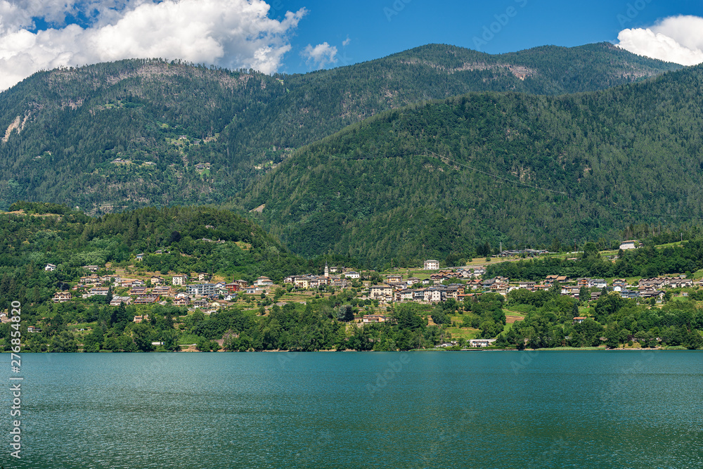 Caldonazzo lake (Lago di Caldonazzo) with the Alps and small village of Ischia, Valsugana valley, Trento province, Trentino Alto Adige, Italy, Europe