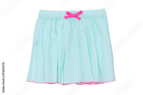 Summer skirt isolated. Closeup of a festive beautiful turquoise little girl short summer skirt with a pink ribbon bow isolated on a white background. Children and kids fashion. Macro
