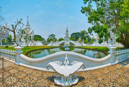 Panorama of ornamental garden of Wat Rong Khun, Chiang Rai, Thailand photo