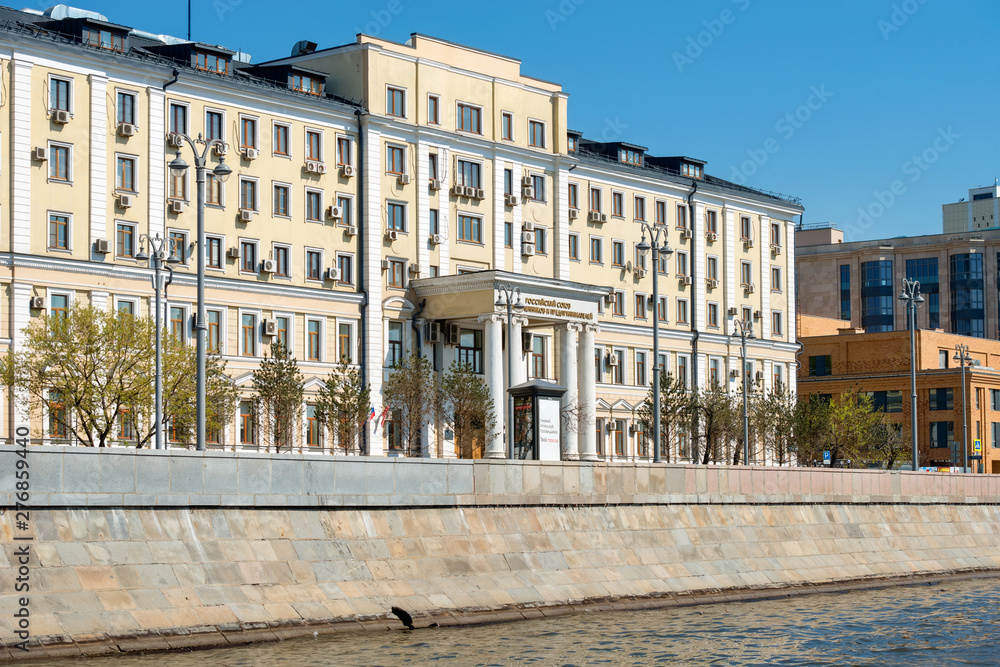 Moscow, Russia - May 6, 2019: View of the Kotelnicheskaya embankment and building Russian Union of Industrialists and Entrepreneurs  on a spring day