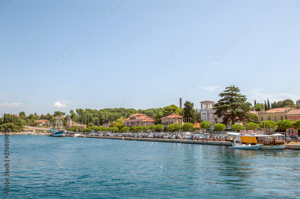Fototapeta premium Beautiful and cozy medieval town of Rovinj, colorful with houses and church in Croatia, Europe