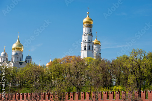 Moscow, Russia - May 6, 2019: View of the Moscow Kremlin, the  Assumption Belfry and cathedrals on Cathedral Square on a summer day