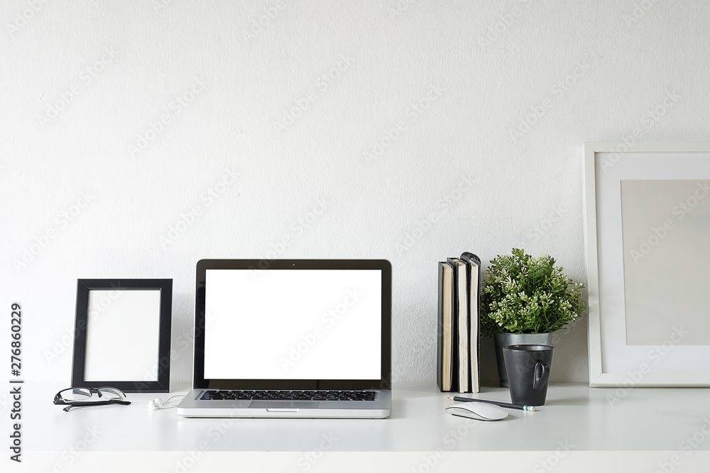 Workspace desk and mockup laptop. copy space and blank screen. Business image, Blank screen laptop and supplies. Workspace desk and mockup laptop. copy space and blank screen. Business image, Blank screen laptop and supplies.