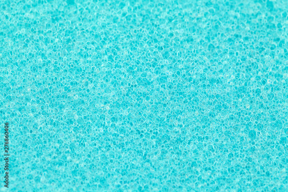 Macro close up of blue sponge for washing.Inside of blue sponge for washing. extreme close up