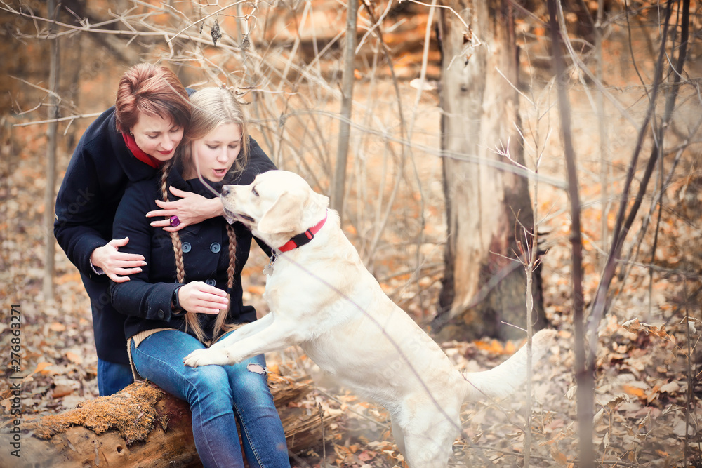Fototapeta premium Young girl on a walk in the autumn
