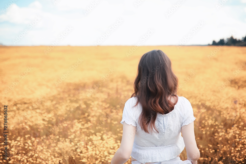 Pregnant woman in nature for a walk in the autumn Pregnant woman in nature for a walk in the autumn