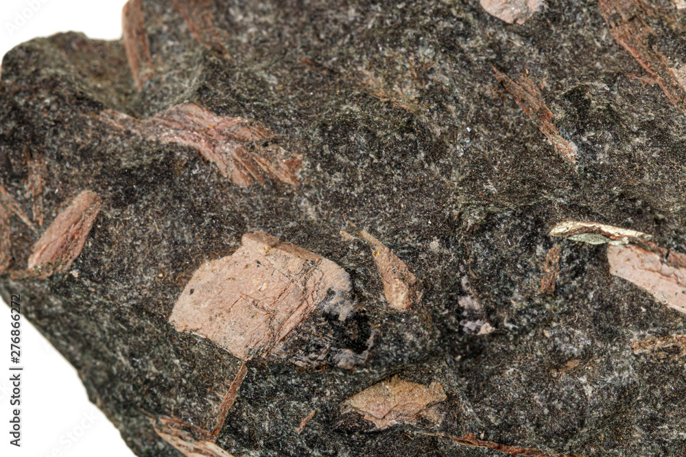 Macro stone mineral Diopside Calcite Magnetite on a white background