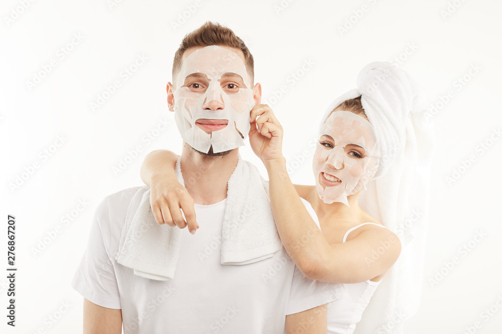 Man and woman use hygienic face masks. - obrazy, fototapety, plakaty 