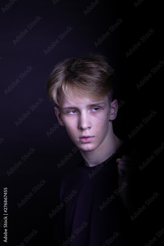 Young caucasian adult posing on black Young caucasian adult posing on black