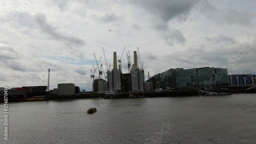 Slow Motion Of Plane Over Battersea Power Station photo