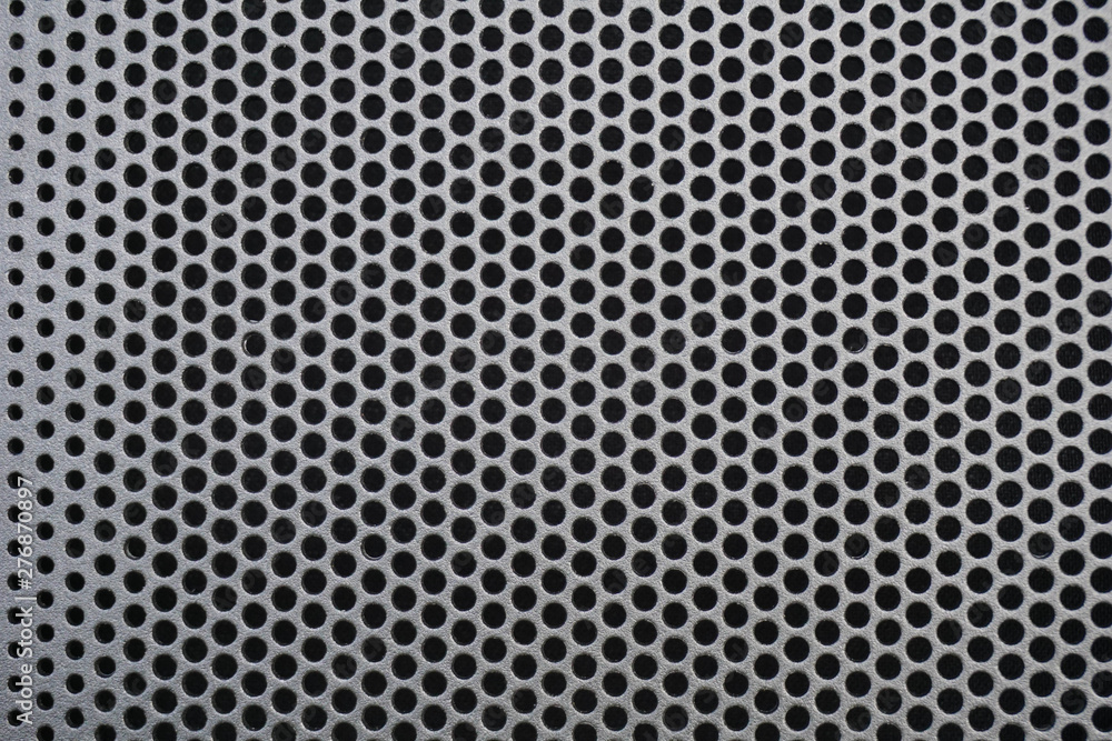 Photo of metal speaker mesh texture Photo of metal speaker mesh texture