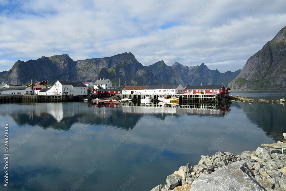 Fishing houses (rorbuer) of Sakrisoy village in front of Lofotenveggen mountain, Moskenesoya island, Lofoten, Norway