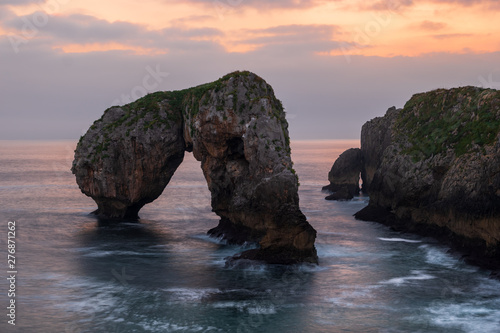 Bizarre rock of Castro de la gaviotas or Elephant Rock at sunset  Asturias Northern Spain