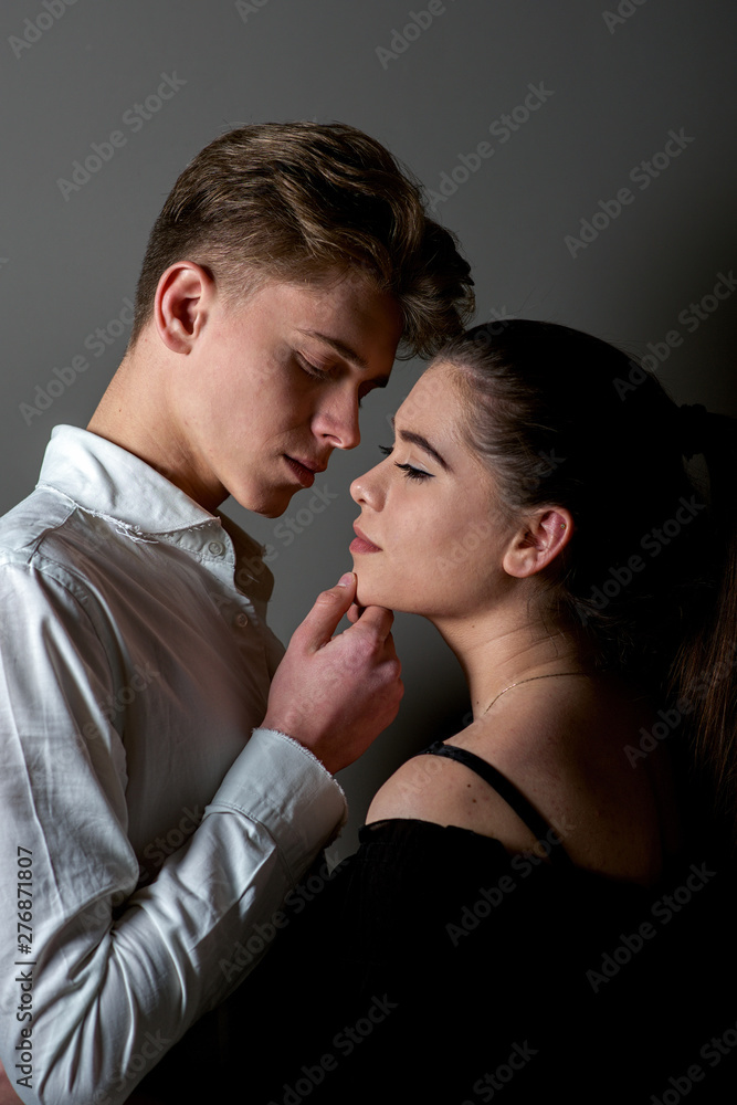 Young caucasian couple preparing to kiss each other Young caucasian couple preparing to kiss each other