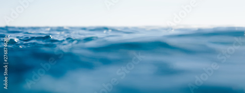 Blurred water background with bokeh for design