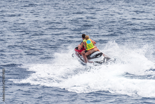 Man and a woman on a jet sky