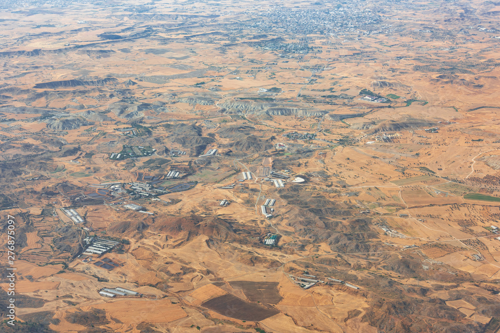 Fototapeta premium Desert relief viewed from an aircraft