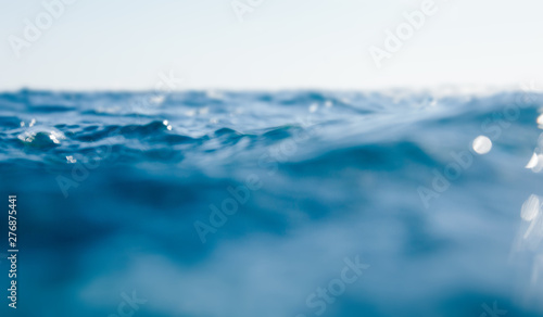 Blurred water background with bokeh for design