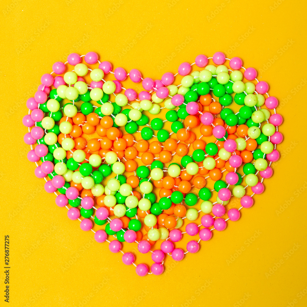 Beads. Bright accessory. Minimal flat lay art Beads. Bright accessory. Minimal flat lay art
