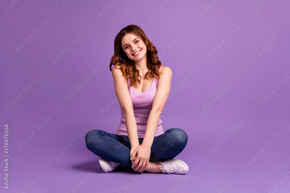 Portrait of pretty millennial feel glad lovely sit wear singlet tank-top modern fashionable isolated colorful purple violet background Portrait of pretty millennial feel glad lovely sit wear singlet tank-top modern fashionable isolated colorful purple violet background