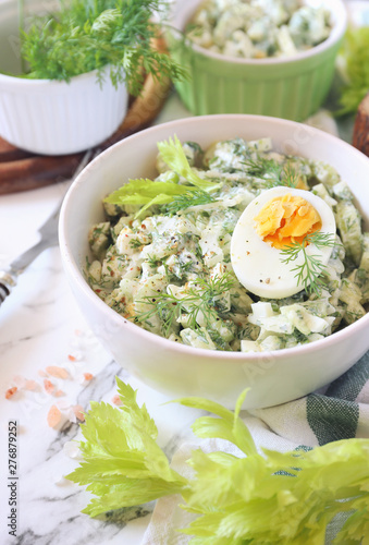 Vitamin light salad with dill, celery, eggs and Greek yogurt