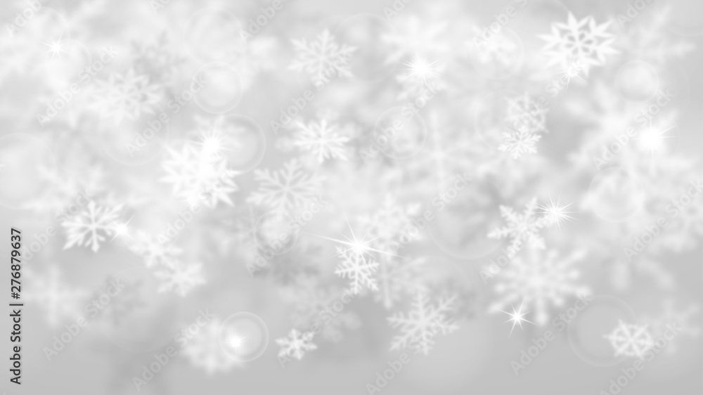Christmas blurred background of complex defocused big and small falling snowflakes in white and gray colors with bokeh effect Christmas blurred background of complex defocused big and small falling snowflakes in white and gray colors with bokeh effect