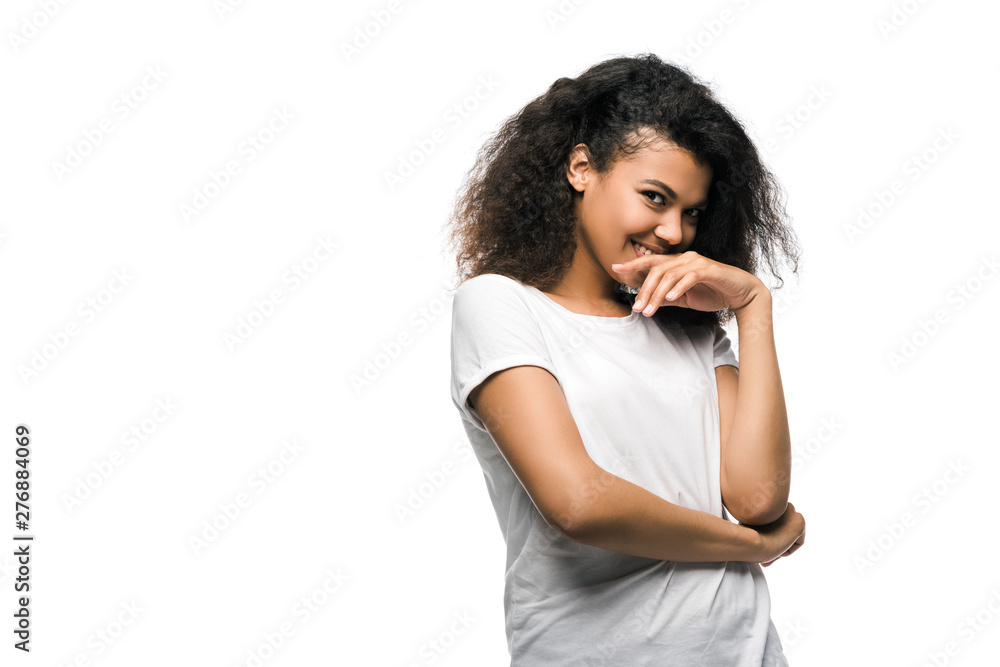 happy african american girl covering face with hand and looking at camera isolated on white happy african american girl covering face with hand and looking at camera isolated on white