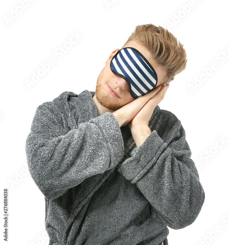 Sleepy man with mask on whi...
