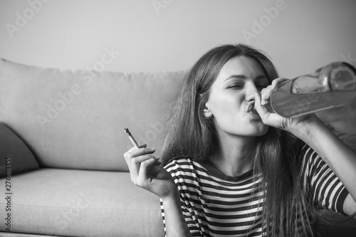 Young woman with addiction ...