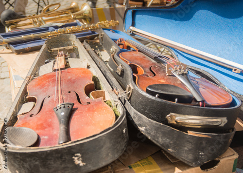 Old violin instrumen on market.