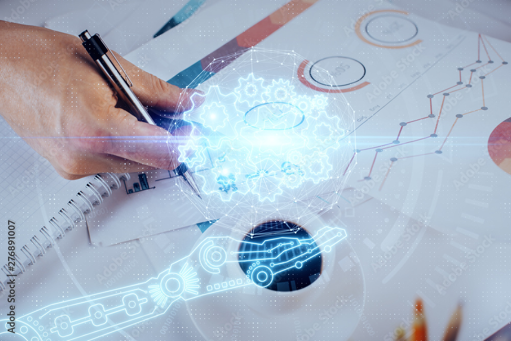 Writing man's hand with technology icons. Writing man's hand with technology icons.