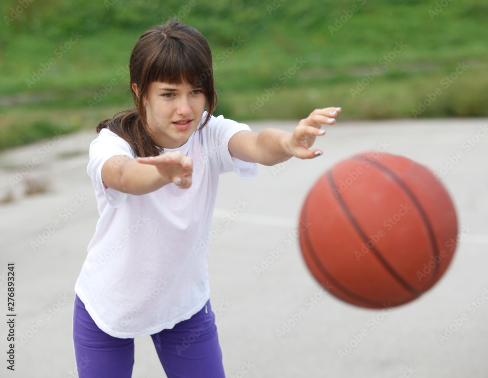 teenage girl scoring during basketball game in school court sport teenage girl scoring during basketball game in school court sport