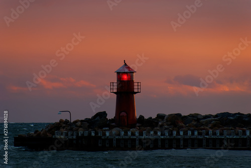 Lighthouse At Sunset