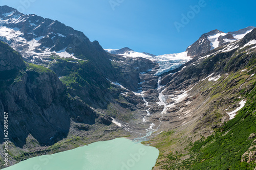 Triftgletscher mit Triftsee in den Schweizer Alpen bei Gadmen photo