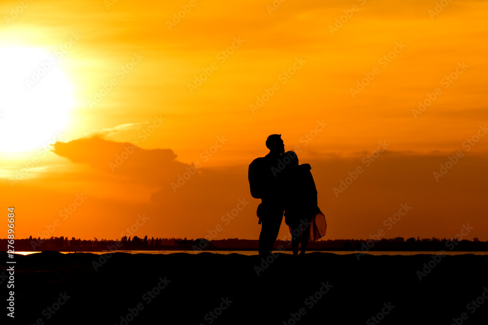 Silhouette traveler couples walking
