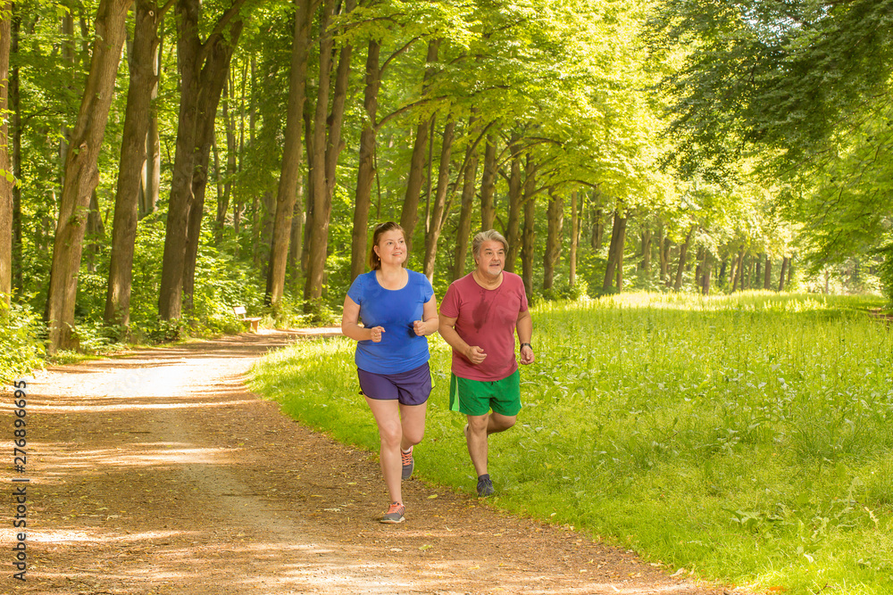 Couple share their session training while running Couple share their session training while running