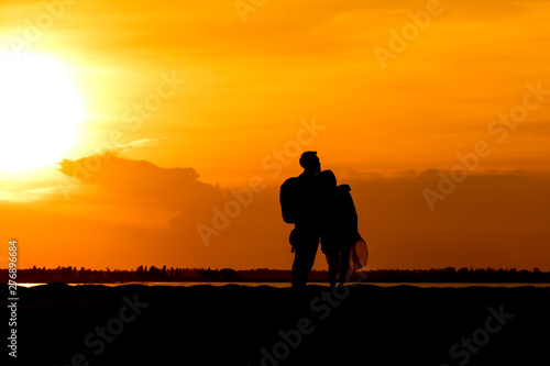 Silhouette traveler couples walking