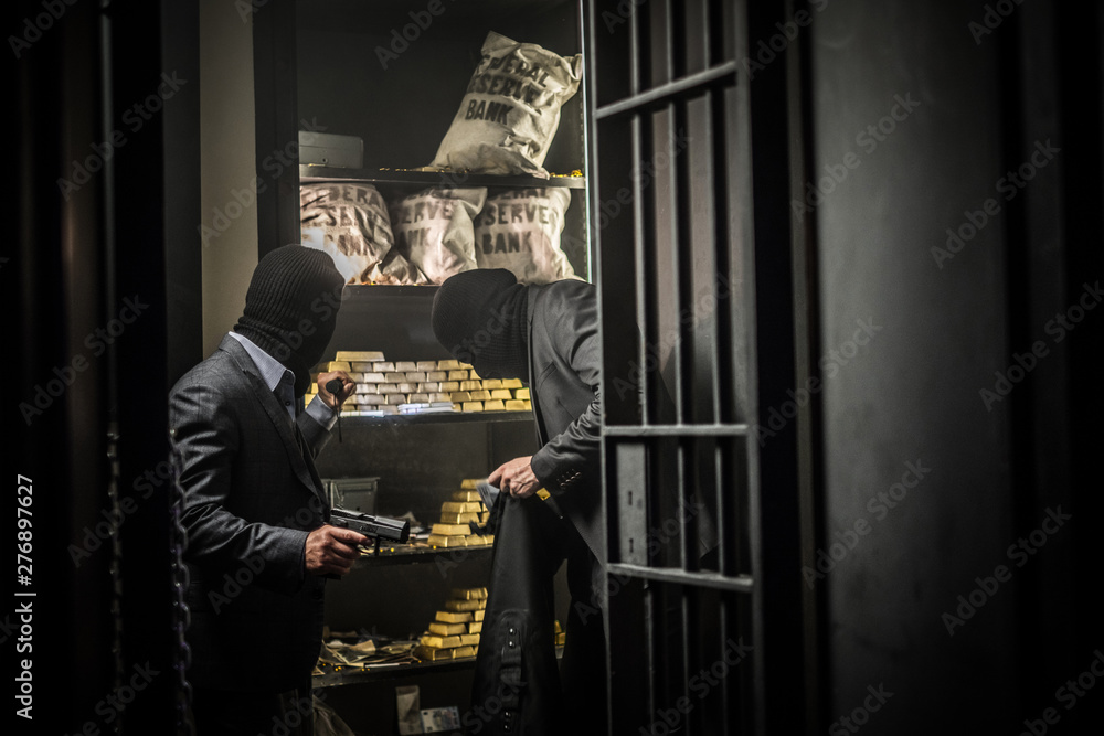 Two ardmed men robbing a bank Two ardmed men robbing a bank
