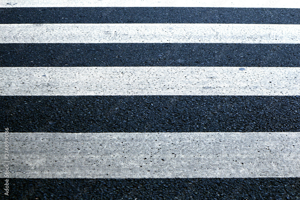 Fototapeta premium White paint lines of a pedestrian lane