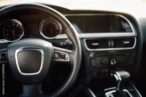 Modern car speedometer and illuminated dashboard. © VAKSMANV