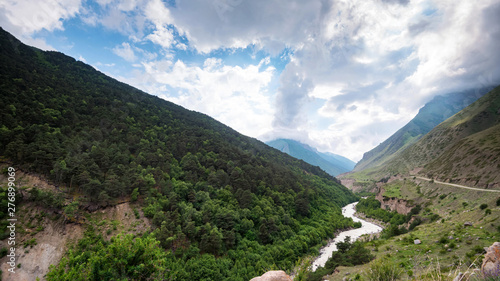 Panoramic view of beautiful mountains and river in northern caucasus in summer