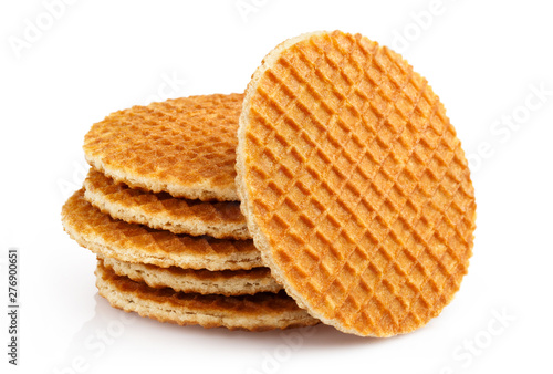 Pile of delicious tasty holland (dutch) waffles with caramel filling, isolated on white background