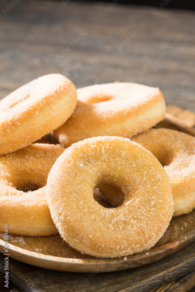 Doughnuts with sugar sprinkles. Rustic style