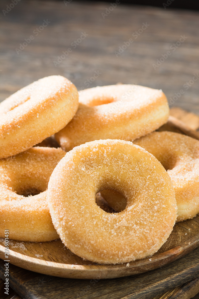 Doughnuts with sugar sprinkles. Rustic style Doughnuts with sugar sprinkles. Rustic style