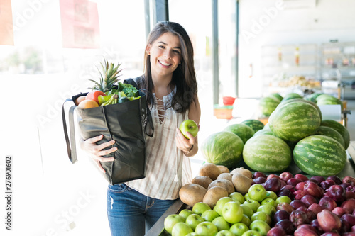 Mid Adult Customer Shopping Healthy Fruits At Market