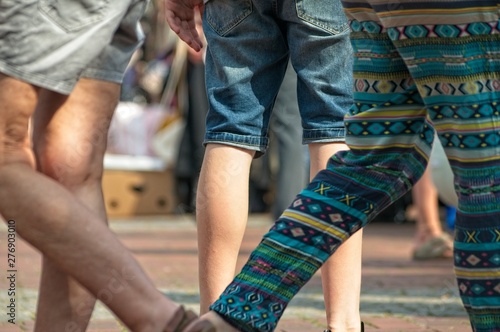 people at a flea market on the streets photo